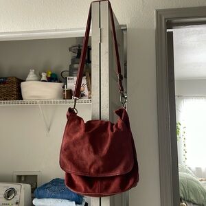 Free People cherry cola suede crossbody and back pack satchel bag. $50 OBO.